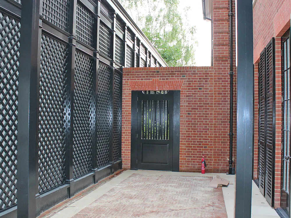 garden gate and trellis painted black