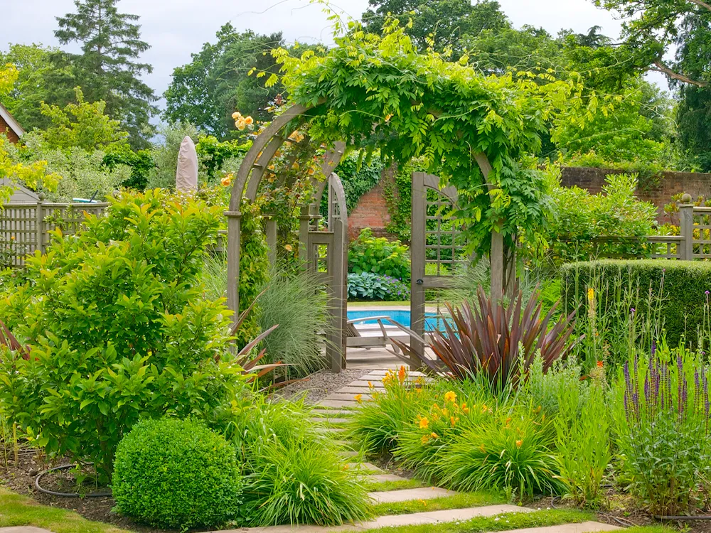 arch and gate to private pool